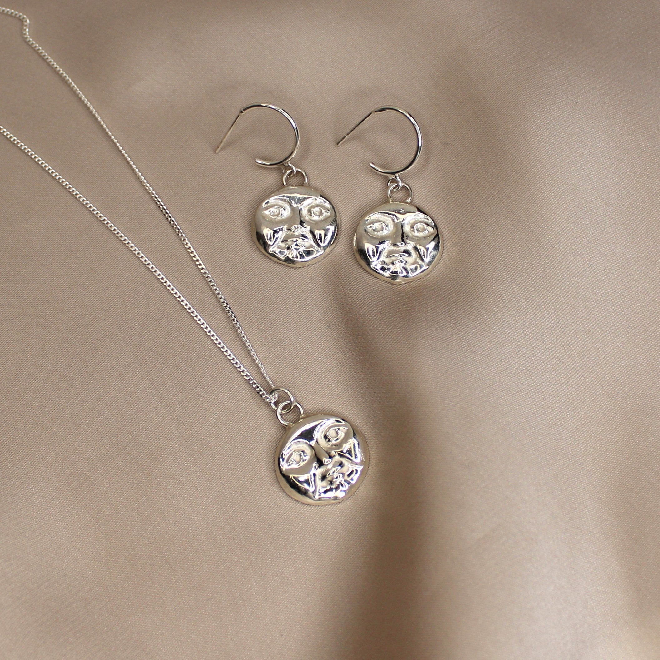 Watchful Moon Pendant
